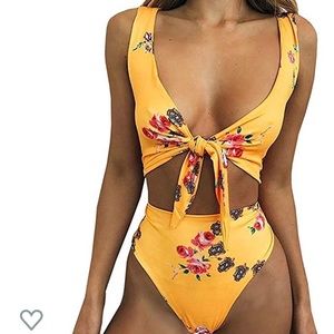 Yellow cutout onepiece.